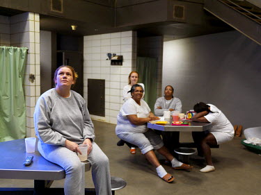 Women inmates watching television at Putnam County Jail.