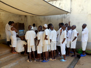 Death Row inmates watching television at Luzira Upper Prison, Uganda's largest maximum security prison. It was built in the 1920s to accommodate 600 prisoners. On the 3 April 2015 it housed 3,114, of...