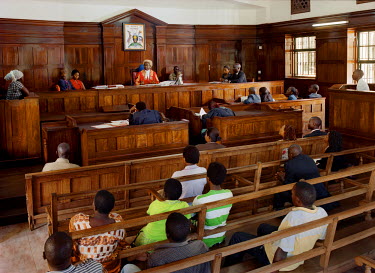 Kampala High Court in session, presided over by Judge Benjamin Kabiito.