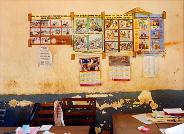 Posters on a wall in the office of the Anti-Corruption, Economic and Narcotic Squad in Kakira Police Station.