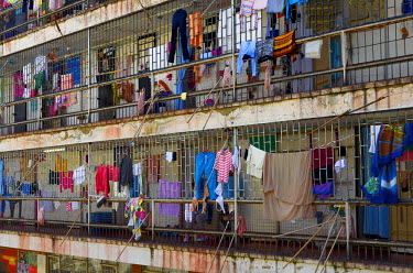 Clothes drying from the security bars at El Buen Pastor women's prison. Built in the 1950s for 1,275 inmates, in August 2015, it housed 1,785 prisoners and a number of their children.
