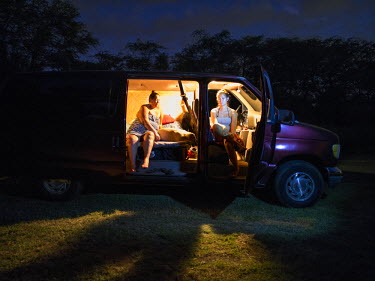 Randymae Kauwai, 52 and her daughter, Mikilani, 23, live in their van on a road behind Kanea Beach park. Randymae has 5 children. Her income on disablity benefit is $720 per month but to rent an apart...