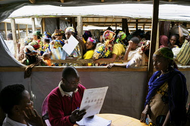 Refugee from the Central African Republic have their documents checked in the Gado Refugee Camp before receiving their rations for the month.   Cameroon is home to over 230,000 refugees from neighbour...