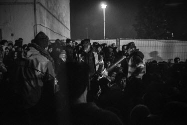 Slovenian border guards attempt to subdue the surge of asylum seekers that are flowing through the processing camp in Slovenia on their way through to Austria. Most of the migrants claim to be from Sy...