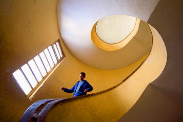 A staircase in an apartment house built in 1944 by architect A. Bibolotti. Asmara is a showcase of 1930s Italian Art Deco architecture. Initially brought to the region by colonial-era Italians, the st...