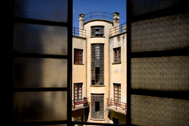 The internal courtyard of the Falletta Building, an apartment block built in the rationalist style influenced by Italian avant-garde architecture. Built in 1937/38 by architects Giuseppe Cane, Carlo M...