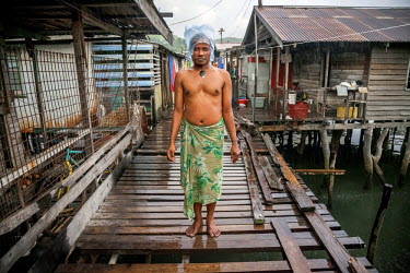 Haraga 'Speedy', 35, a gay man from Hanuabada/Elevala village. This village is considered one of the few places in PNG where gay men can live in safety. Male homosexuality is prohibited according to s...