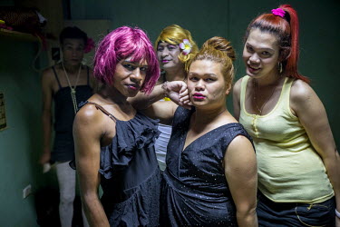 Papua New Guinean and Filipino gay men in the Diamond nightclub during a gay night.