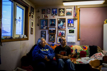 Gene Snell and his wife Florina, at their home in Shishmaref, a barrier island with a population of less than 600 Alaska native Inupiaq people located 30 miles south of the Arctic Circle. The island i...