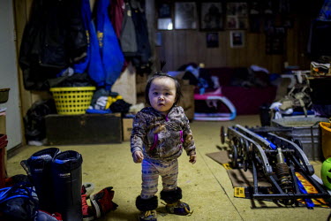 One year old Marie at the family home in Shishmaref, a barrier island with a population of less than 600 Alaska native Inupiaq people located 30 miles south of the Arctic Circle. The island is threate...