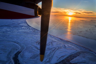 View of the arctic ocean from the flight to Shishmaref, a barrier island with a population of less than 600 Alaska native Inupiaq people located 30 miles south of the Arctic Circle. The island is thre...