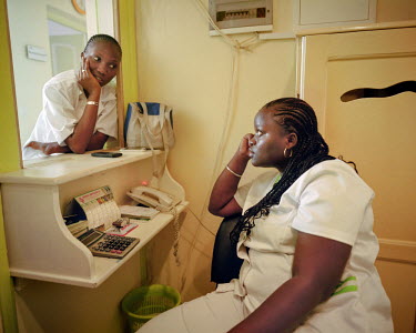 Two nurses at a NEST private healthcare facility chatting during their lunch break. NEST was established by entrepreneur Khadidiatou Nakoulima and her pediatrician father and is aimed at the country's...
