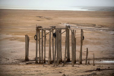An old pier stands, some distance from the water, to the north of the Dead Sea. In the 1950s the sea maintained it size as the in flow of water roughly equalled the amount lost. However, since the 196...