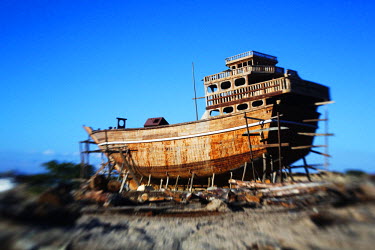 A traditional Iranian Lenj boat being constructed in the Gouran boatyard. This ship is being built by ten Pakistani carpenters who will be paid a thousand US Dollars a year for two years, all the whil...