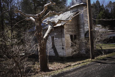 An abandoned church along Route 3 in the Appalachian mountains in West Virginia.  Hard.Landis a journey through rust belt and blue collar America to meet the people struggling to keep the 'American Dr...
