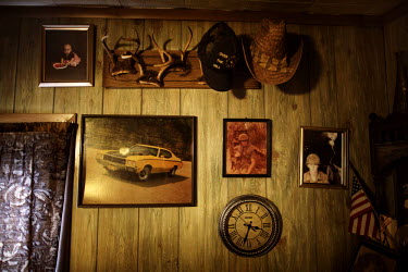 Pictures decorate a wall in the home of Jesse Boggess. He was awarded 16 different medals during service in the Vietnam War from 1969 to 1970, including a Medal of Honor. Now he lives by himself deep...