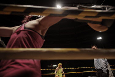 Women fighting in a 'Tough Man' competition. Hard.Landis a journey through rust belt and blue collar America to meet the people struggling to keep the 'American Dream' alive: middle class people, the...
