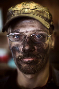 A miner at a coal mine. The 32 miners work eight hour shifts but the working conditions are tough. They breath in dust while crawling through the low tunnels, many end up with disabilities. 'Working i...