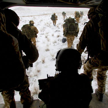 British Gurkha troops are dropped from a Dutch Chinook helicopter as they make their way to a village in the hope of capturing key Taliban leaders.