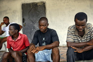Some of the 30 young men who worked at a crematorium during the ebola outbreak, in August 2015 they were called on during the height of the crisis, when bodies were piling in the streets and global he...