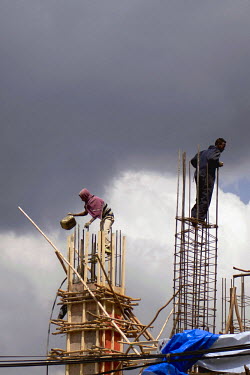 Workers on a building site and regeneration project.