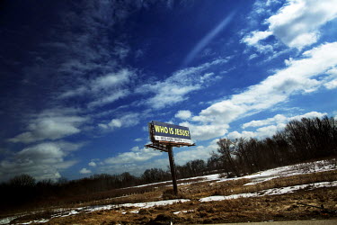 A sign by side of the road outside Detroit reads: 'Who is Jesus? 855-FOR-TRUTH'. Hard.Landis a journey through rust belt and blue collar America to meet the people struggling to keep the 'American Dre...
