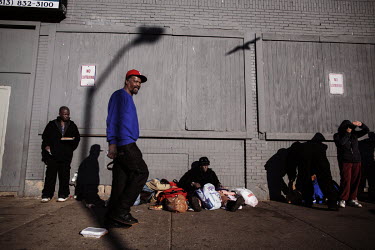 Homeless people at 3430 Third Street where every Sunday, Brian Stone (29) and his team delivers free food to some of the more than 30,000 homeless people in the city. Hard.Land is a journey through r...