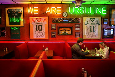 A couple eating in the 'Golden Dawn' diner and bar in Youngstown, a city in the 'Rust Belt' that was once a centre of steel production. The Golden Dawn was once one of many hangouts popular with worki...