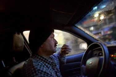 Taxi driver Mohammed Khan works six days a week as a taxi driver in New York. Every shift is 12 hours and he earns, on average, 100 USD a day. Hard.Landis a journey through rust belt and blue collar A...