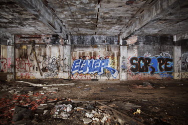 Graffiti in the former Packard automobile plant. The factory produced vehicles from 1903 until it closed in 1958. The building complex, measuring 325,000 square metres, has been totally abandoned sinc...