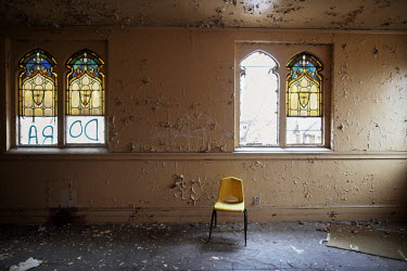Peeling walls in one of several abandoned churches in the city centre. Numerous public buildings, churches, factories and shops have been closed down and left unguarded for the metal scrappers to dest...