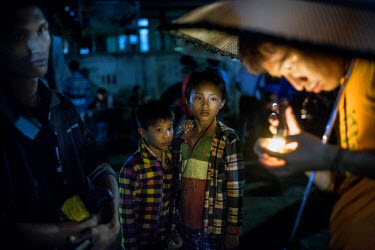 Both seven year old refugee Breng Aung and his brother are from the local ethnic Kachin minority who have been displaced by the armed-conflict, fought in the jade-rich region, between the Burmese mili...