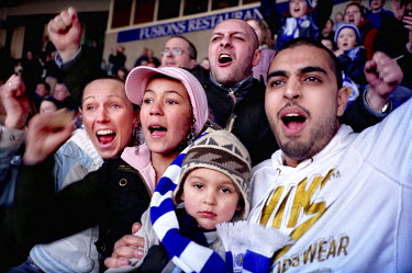 Fans at a football match between Leicester City and Hull FC in the Coca-Cola Football League Championship at The Walker's Stadium (now called the King Power Stadium) L-R: Sarah, Cherish, Sanchez, Saje...