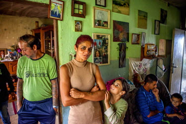 Ondrej (50) and his wife Janeta (42) with some of thier eight children in their flat on the Lunik IX housing estate, a decrepit complex almost entirely populated by Roma (6542 residents registered as...