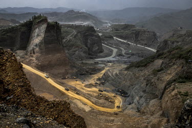 A government-licensed jade mine. A 1994 ceasefire between the Kachin Independence Army and the Burmese military brought most of the jade producing areas back under government control. Since then, larg...