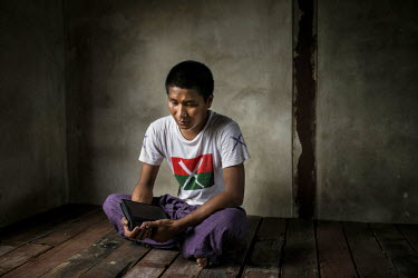 Dee Dum, a 27 year old Kachin man sits in a room at the YCC drug rehabilitation centre holding a bible. He has just finished a 40-day heroin detox at the centre founded in 2009 by a former convict and...