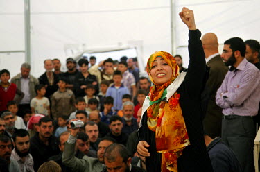 Yemeni activist Tawakul Karman, one of the Nobel Peace Prize winners of 2011, addresses a crowd of Syrian refugees at a camp.