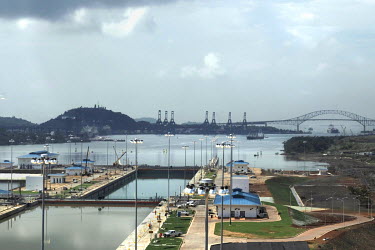 A new set of locks at the Pacific end of the Panama Canal with the Bridge of the Americas in the background. When the Panama Canal Expansion is complete, 26 June 2016, ships specified as New Panimax,...
