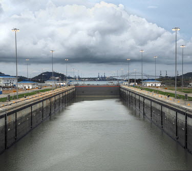A new set of locks at the Pacific end of the Panama Canal with the Bridge of the Americas in the background. Construction work for the Panama Canal Expansion will allow ships specified as New Panimax,...