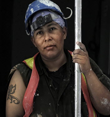 laura Samudio, 32 years old, a builder working on the Panama Canal Expansion and the only women working in the construction area. When the Panama Canal Expansion is complete, 26 June 2016, ships speci...
