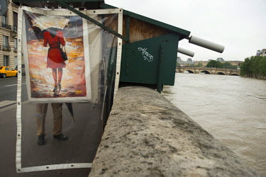 A stall selling art works beside the Seine River.Following several days of heavy rains the Seine River could reach a height of 6.50 metres about double its normal level. The flooding has caused the te...