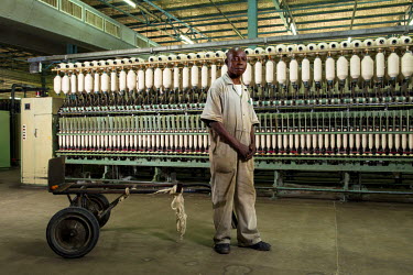 A worker in the Sotexki textile factory, the last plant in the country where fabrics are made as local factories struggle to compete with cheaper Chinese imports.