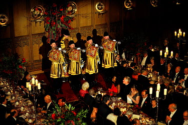 Formal trumpets at the annual Lord Mayor's Banquet in London's Guildhall. The banquet is attended by the prime minister, law lords, financiers, diplomats and various members of the establishment.