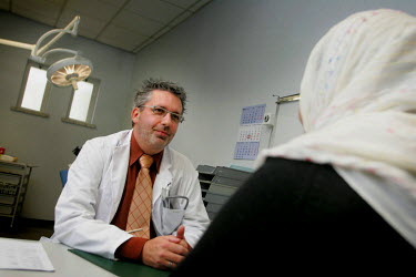 A Muslim woman consults with a male gynaecologist at the St. Erasmus Hospital.