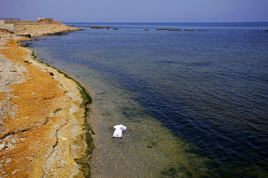 A dead body floats in the Mediterranean Sea.