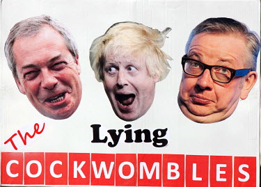 A placard featuring Nigel Farage, Boris Johnson and Michael Gove during a rally in central London held by people protesting the result of the referendum to leave or remain in the European Union. A wee...