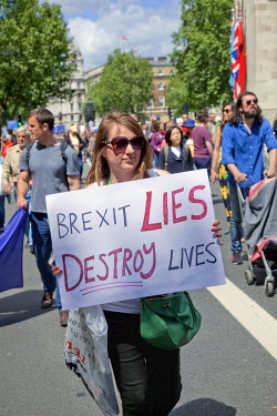 A woman holds up a placard during a rally in central London held by people protesting the result of the referendum to leave or remain in the European Union. A week earlier British voters decided to le...