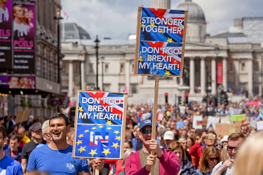 Placards calling for the UK to remain in the European Union held aloft during a rally in Whitehall in central London held by people protesting the result of the referendum to leave or remain in the EU...