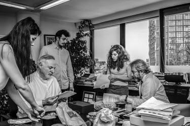 Can Dundar (right), the editor-in-chief of the national newspaper 'Cumhuriyet' (Republic), deciding on stories and the layout for the next edition in the newspaper's offices. Dundar was charged with t...
