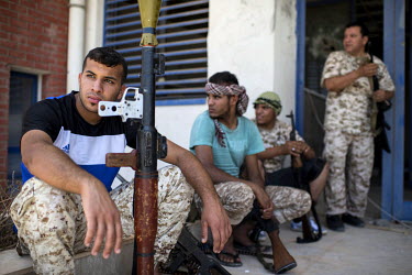 A scouting group prepares for a reconnaissance mission around Sirte's television station in 'District 2' that is fiercely defended by IS militants. Various Libyan army units, mainly made up of brigade...